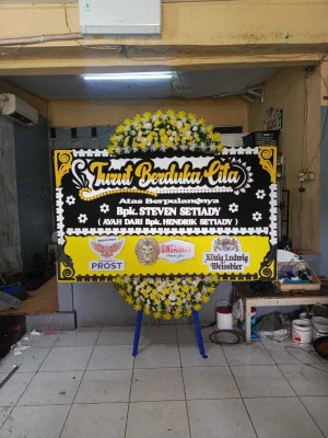 Papan Bunga di Kayu Manis